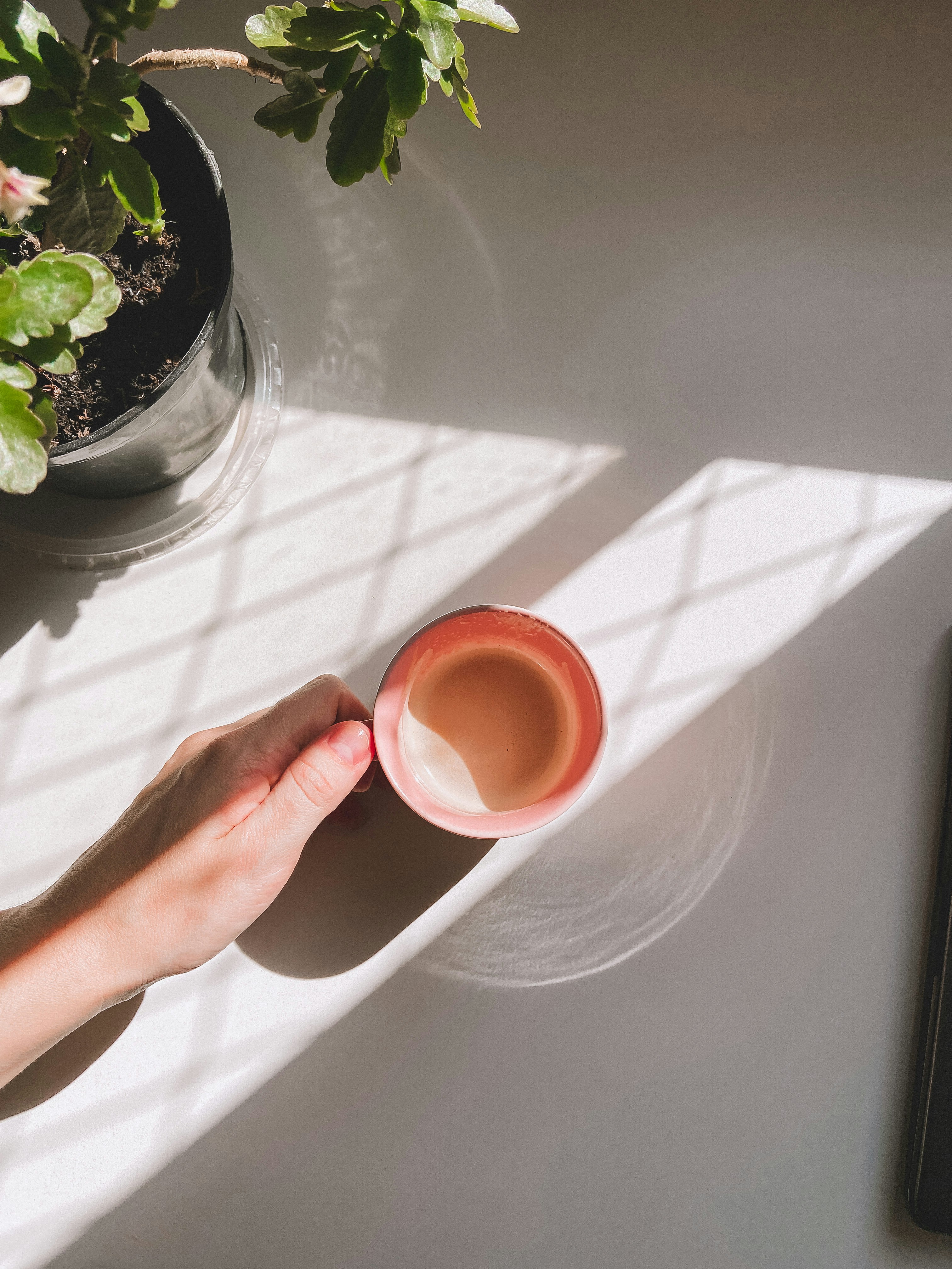 Coffee in a pink glass